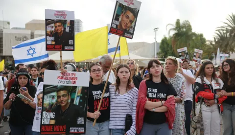 epa12094348 People react as they gather watching a live stream on a big screen reporting on the release of Israeli American soldier hostage Edan Alexander, in hostages square outside the Kirya military base in Tel Aviv, Israel, 12 May 2025. According to Israeli defence forces some 58 hostages remain in Hamas captivity. EPA/ABIR SULTAN