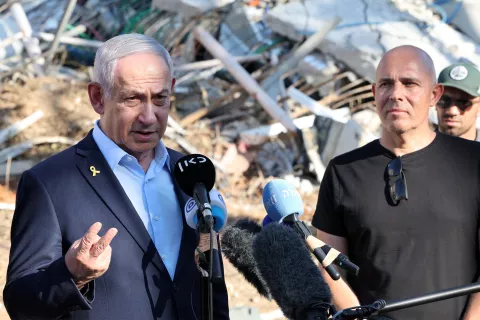 epa12187748 Israel's Prime Minister Benjamin Netanyahu (L) delivers a statement to the press next to Professor Alon Chen (R), President of the Weizmann Institute of Science during a visit to the site of the Weizmann Institute of Science, which was hit by Iranian missiles in the central city of Rehovot, Israel, 20 June 2025. Iran and Israel have been exchanging fire since Israel carried out missile strikes on Iran on 13 June 2025. EPA/JACK GUEZ/POOL
