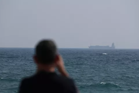 epa12192587 A container ship sails on the Strait of Hormuz, as seen from Ras Al Khaimah, United Arab Emirates, 23 June 2025. The Strait lies between Oman and Iran and links the Gulf to the Arabian Sea. The Iranian parliament approved a measure to close the Strait of Hormuz, following US strikes on three of Iran's key nuclear sites on 22 June 2025. Israel and Iran have been exchanging fire since Israel launched strikes across Iran on 13 June 2025. EPA/ALI HAIDER
