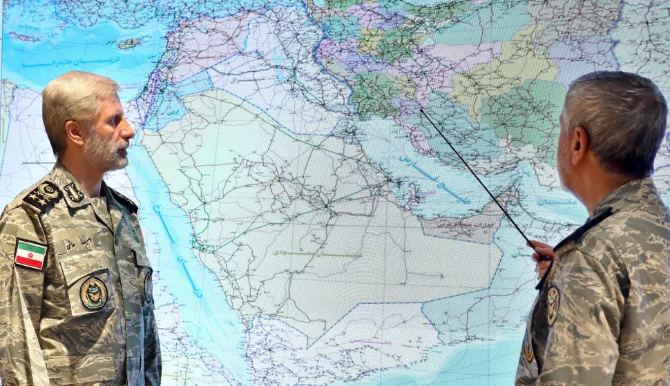 epa12192360 A handout photo made available by the Iranian Army Media Office on 23 June 2025, shows the commander-in-chief of the Iranian Army Amir Hatami (L) attending a meeting in the Iranian Army's War Command Room, in an unknown location. The US forces struck three of Iran's key nuclear sites: Natanz, Isfahan and Fordo, US President Trump announced on 21 June. Israel and Iran have been exchanging fire since Israel launched strikes across Iran on 13 June 2025 as part of Operation 'Rising Lion.' EPA/IRANIAN ARMY MEDIA OFFICE HANDOUT HANDOUT EDITORIAL USE ONLY/NO SALES