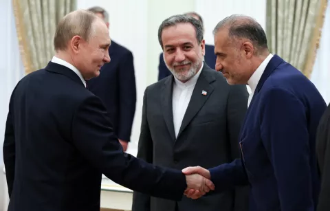 epa12192618 Russian President Vladimir Putin (L) shakes hands with Iranian Ambassador to Russia Kazem Jalali (R) as Iranian Foreign Minister Abbas Araghchi (C) looks on during their meeting at the Kremlin in Moscow, Russia, 23 June 2025. EPA/ALEXANDER KAZAKOV/SPUTNIK/KREMLIN POOL