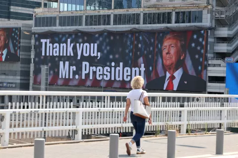 epa12190499 A woman walks past a billboard thanking US President Donald Trump in Tel Aviv, Israel, 22 June 2025. The US forces struck three of Iran's key nuclear sites: Natanz, Isfahan and Fordo, US President Trump announced on 21 June, amid an escalating conflict between Iran and Israel since 13 June. EPA/ABIR SULTAN