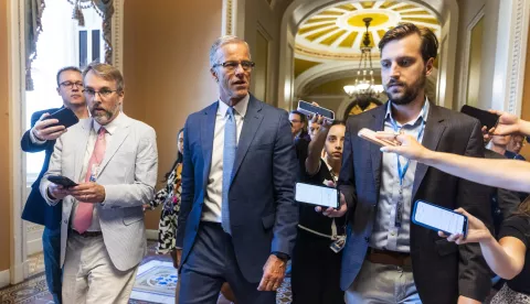 epa12208490 Republican Senate Majority Leader John Thune (C) speaks to reporters about the so-called 'Big, beautiful bill' in the US Capitol in Washington, DC, USA, 01 July 2025. Thune said he hopes to have a deal for the bill's passage in the Senate later in the day. According to the Congressional Budget Office, the bill will add nearly 3.3 trillion dollars to the US national deficit. EPA/JIM LO SCALZO