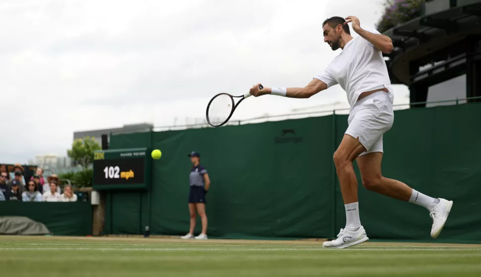 epa12218729 Marin Cilic of Croatia in action during the Men's 3rd round match against Jaume Munar of Spain at the Wimbledon Championships, Wimbledon, Britain, 05 July 2025. EPA/NEIL HALL EDITORIAL USE ONLY