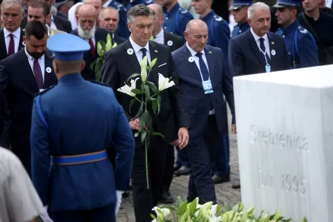 11.07.2025., Potocari, Bosna i Hercegovina - Obiljezavanje 30. godisnjice genocida u Srebrenici. Polaganje vijenaca. Armin Hodzic, predsjednik Vlade RH Andrej Plenkovic i potpredsjednik Vlade i ministar branitelja Tomo Medved Photo: Armin Durgut/PIXSELL