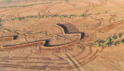 epa06959504 A picture made available on 20 August 2018 shows an aerial view of the earth works in preparation for flood mitigation near White Cliffs, New South Wales, Australia, 18 August 2018. With New South Wales 100 per cent drought declared farmers are off loading their stock in record numbers. EPA/DAVID MARIUZ AUSTRALIA AND NEW ZEALAND OUT