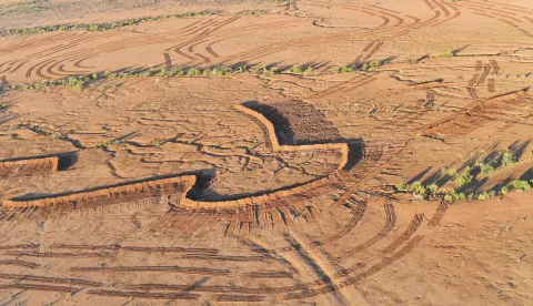 epa06959504 A picture made available on 20 August 2018 shows an aerial view of the earth works in preparation for flood mitigation near White Cliffs, New South Wales, Australia, 18 August 2018. With New South Wales 100 per cent drought declared farmers are off loading their stock in record numbers. EPA/DAVID MARIUZ AUSTRALIA AND NEW ZEALAND OUT