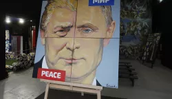 epa11958368 An artwork titled 'The Peace' (2017) by Russian artist Alexey Sergienko showing Russian President Vladimir Putin and US President Donald Trump is once again on display at the artist's gallery in St. Petersburg, Russia, 12 March 2025. The artist first showcased the painting in 2017 when the two Presidents met for the first time at the G20 summit in Hamburg. EPA/ANATOLY MALTSEV