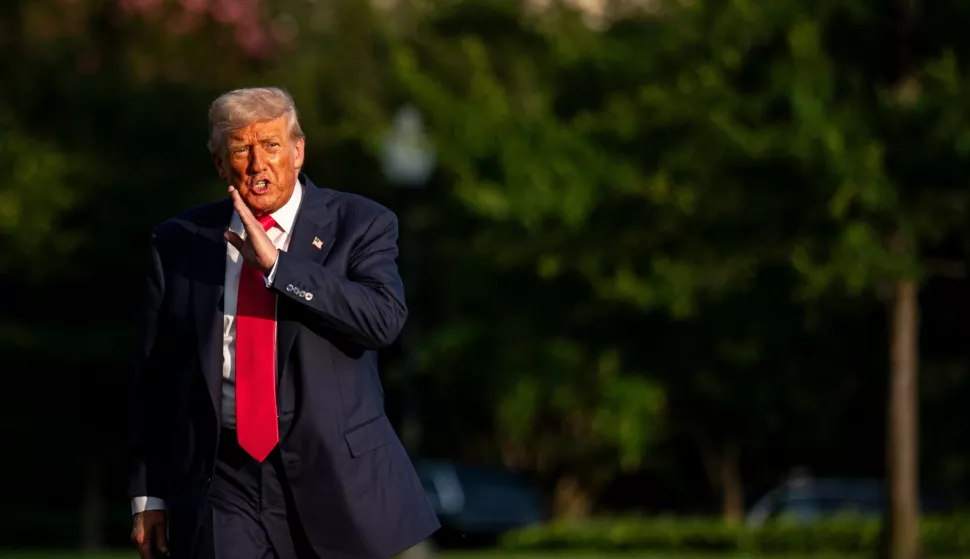 epaselect epa12240022 US President Donald Trump walks on the South Lawn of the White House after arriving on Marine One in Washington, DC, USA, 15 July 2025. Trump hailed more than $92 billion US dollars in investments in artificial intelligence and energy infrastructure during a visit to Pennsylvania, highlighting his efforts to bolster US competitiveness in the AI field. EPA/Al Drago/POOL