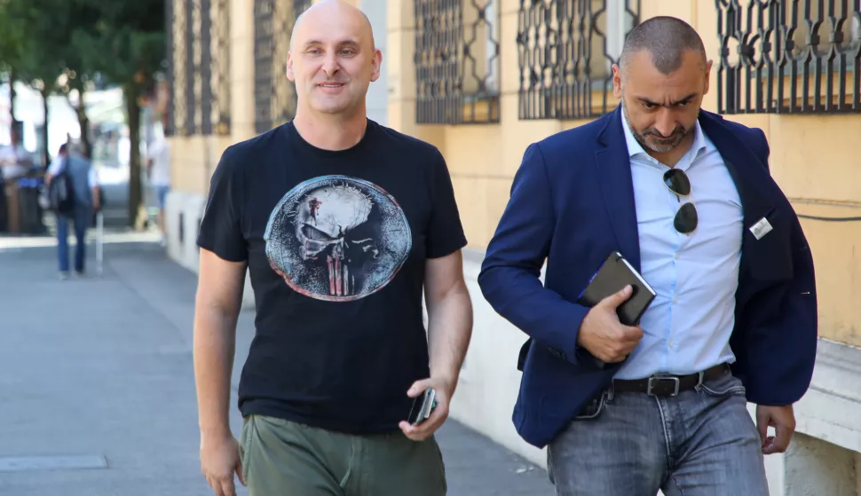 Zagreb, 20.06.2022. - Bivši HDZ-ov ministar Tomislav Tolušić odlazi iz USKOK-a nakon što je dao iskaz vezano za pogodovanje u zapošljavanju i zlouporabu položaja. Na slici Tomislav Tolušić i njegov odvjetnik Ivan Stanić. Foto HINA/ Damir SENČAR/ ds