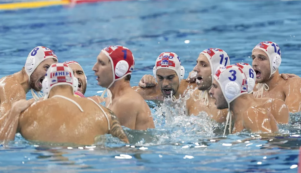 epa12249424 Members of Team Croatia react before the start of the Men Water Polo quarter-finals match between Croatia and Hungary at the World Aquatics Championships Singapore 2025 in Singapore, 20 July 2025. EPA/SIMON LIM