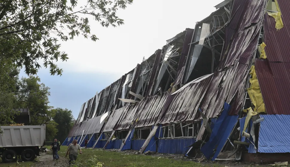 epa12263260 The site of a Russian strike on a sports complex in a residential area in Kharkiv, northern Ukraine, 26 July 2025, amid the ongoing Russian invasion. At least 6 people, including two children, were injured after Russian forces attacked Kharkiv with glide bombs, rockets, and drones, the State Emergency Service (SES) of Ukraine reported. EPA/SERGEY KOZLOV