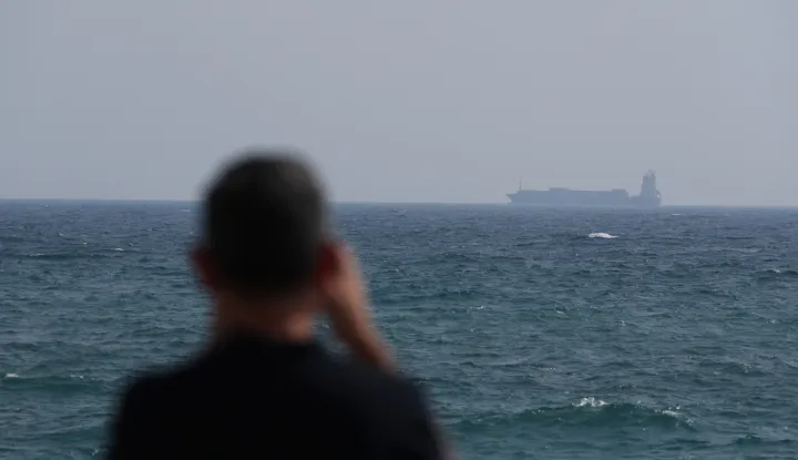 epa12192587 A container ship sails on the Strait of Hormuz, as seen from Ras Al Khaimah, United Arab Emirates, 23 June 2025. The Strait lies between Oman and Iran and links the Gulf to the Arabian Sea. The Iranian parliament approved a measure to close the Strait of Hormuz, following US strikes on three of Iran's key nuclear sites on 22 June 2025. Israel and Iran have been exchanging fire since Israel launched strikes across Iran on 13 June 2025. EPA/ALI HAIDER