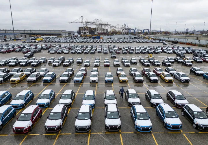 epa12016592 An image taken with a drone shows new Mitsubishi automobiles awaiting transport from the Dundalk Marine Terminal in Baltimore, Maryland, USA, 07 April 2025. In an attempt to bolster US auto production, the Trump administration has placed a 25 percent tariff on imported cars and car parts. EPA/JIM LO SCALZO