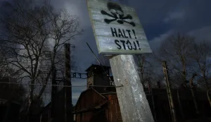 epa11856845 A sign reads 'Stop!' at the area of the former Auschwitz camp in Oswiecim on the 80th anniversary of the liberation of the German Nazi concentration and extermination camp Auschwitz-Birkenau, in Oswiecim, Poland, 27 January 2025. The largest of the German Nazi death camps, KL Auschwitz-Birkenau, was liberated by the Soviet Red Army on 27 January 1945. The world commemorates its liberation by observing International Holocaust Remembrance Day annually on 27 January. EPA/LESZEK SZYMANSKI POLAND OUT