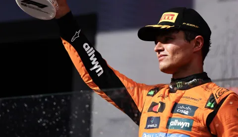 epa12281928 First placed McLaren driver Lando Norris of Britain poses on the podium with the trophy after the Formula 1 Hungarian Grand Prix at the Hungaroring racetrack in Mogyorod near Budapest, Hungary, 03 August 2025. EPA/ANNA SZILAGYI