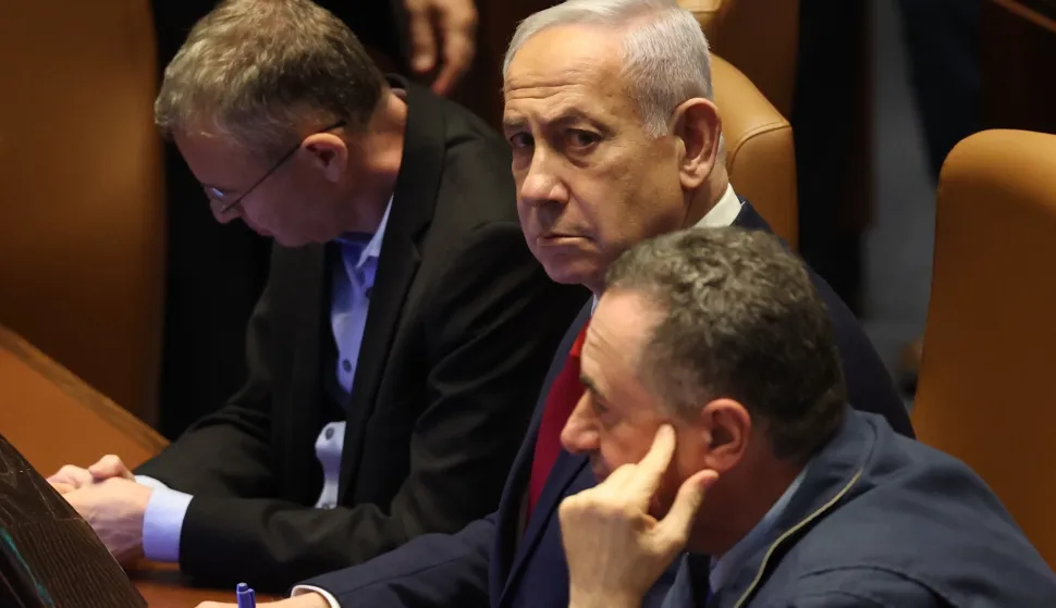 epa12255998 Israeli Prime Minister Benjamin Netanyahu (C) attends a plenary session to vote on a bill for applying Israeli sovereignty over the West Bank territory, at the Knesset, the Israeli parliament, in Jerusalem, 23 July 2025. The bill, submitted by the Religious Zionist Party, calls for the imposition of Israeli sovereignty over the occupied West Bank, and the use of 'Judea and Samaria' instead of West Bank in Israel's legislation. EPA/ABIR SULTAN