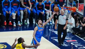 epa12186527 Oklahoma City Thunder center Chet Holmgren (R) takes a shot against Indiana Pacers forward Andrew Nesmith (L) during the first half of game six of the NBA finals between the Oklahoma City Thunder and the Indiana Pacers at the Gainbridge Fieldhouse in Indianapolis, Indiana, USA, 19 June 2025. EPA/BRIAN SPURLOCK SHUTTERSTOCK OUT
