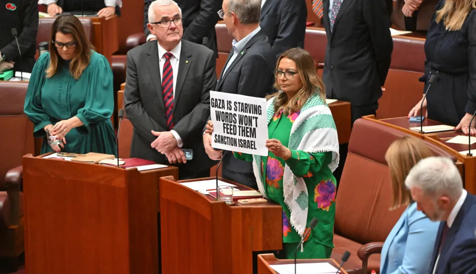 epa12252531 Greens Senator Mehreen Faruqi (Center R) protests as Australian Prime Minister Anthony Albanese (not pictured) walks out of the Senate chamber for the opening of the 48th Federal Parliament at Parliament House in Canberra, Australia, 22 July 2025. EPA/Mick Tsikas AUSTRALIA AND NEW ZEALAND OUT