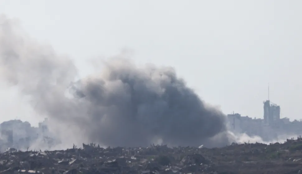 epa12288702 Smoke rises as a result of an explosion in the northern part of the Gaza Strip, as seen from the Israeli side of the border with Gaza, in southern Israel, 07 August 2025 EPA/ATEF SAFADI