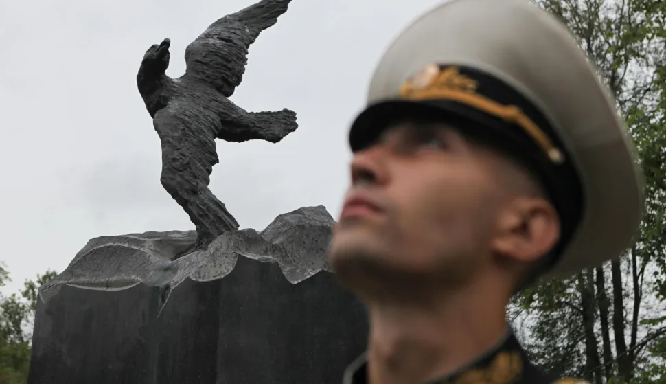 RUSSIA-ST. PETERSBURG-KURSH SUBMARINE ACCIDENT-COMMEMORATION(140812) -- ST. PETERSBURG, Aug. 12, 2014 (Xinhua) -- A soldier attends a ceremony in memory of soldiers who died in the Kursk submarine disaster, at the Serafimovskoe cemetery in St. Petersburg, Russia on Aug. 12, 2014. Russians commemorated on Tuesday the 118 soldiers who died in the Kursk submarine accident on Aug. 12, 2000. (Xinhua)xinhua Photo: XinHua/PIXSELL