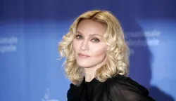 epa06952253 (FILE) - US singer Madonna poses during a photo call for her film 'Filth and wisdom' at the 58th Berlin International Film Festival in Berlin, Germany, 13 February 2008 (reissued 16 August 2018). Madonna is celebrating her 60th birthday on 16 August 2018. EPA/JOERG CARSTENSEN GERMANY OUT