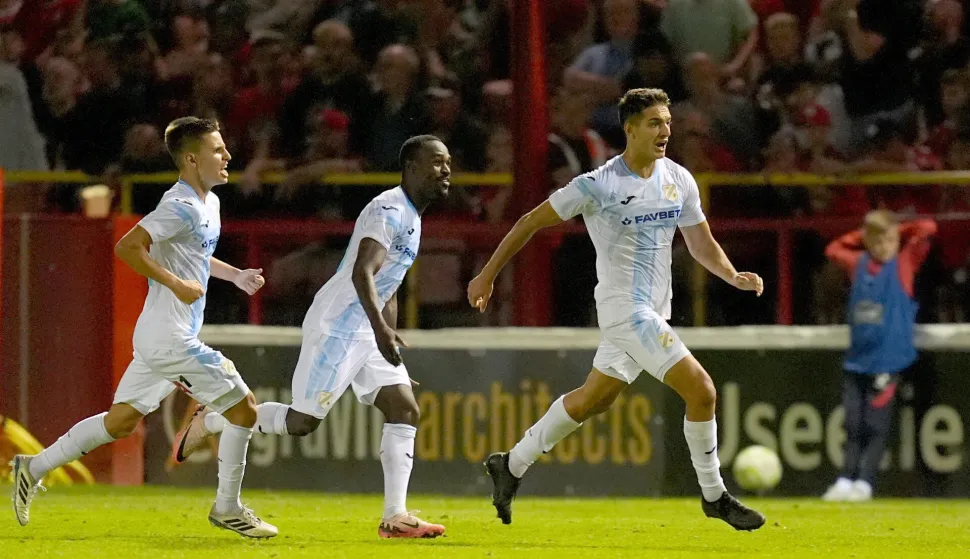 Rijeka's Ante Orec (right) celebrates after scoring his sides third goal during the UEFA Europa League, third qualifying round, second Leg match at Tolka Park, Dublin in Ireland. Picture date: Tuesday August 12, 2025. Photo: Niall Carson/PRESS ASSOCIATION