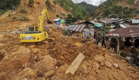 epa11469741 A handout photo made available by the Indonesian Rescue Agency (Basarnas) shows rescuers searching for lanslide victims in Tulabo village, Samawa, Gorontalo, Indonesia, 10 July 2024. According to Basarnas, at least 23 people were killed and 32 went missing after heavy rain triggered landslides in Sulawesi Island. EPA/BASARNAS/HANDOUT HANDOUT EDITORIAL USE ONLY/NO SALES