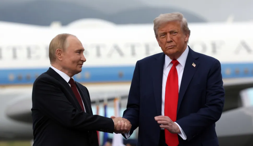 epa12303633 US President Donald Trump (R) and Russian President Vladimir Putin pose on the podium on the tarmac after they arrived to attend a meeting at Joint Base Elmendorf-Richardson in Anchorage, Alaska, USA, 15 August 2025. EPA/GAVRIIL GRIGOROV/SPUTNIK/KREMLIN POOL/POOL MANDATORY CREDIT