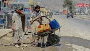 epa12317874 A man buys drinking water from a private shop in Kabul, Afghanistan, 22 August 2025. Kabul is experiencing a severe water crisis, with residents across multiple districts struggling to access clean water due to falling underground water levels, over-extraction, and inadequate management. Many families are forced to walk long distances to fill containers from remaining wells or pay inflated prices for water deliveries. Experts warn that climate change, drought, and rapid population growth are exacerbating the issue, leaving wells dry and forcing families into increasingly desperate circumstances. EPA/SAMIULLAH POPAL