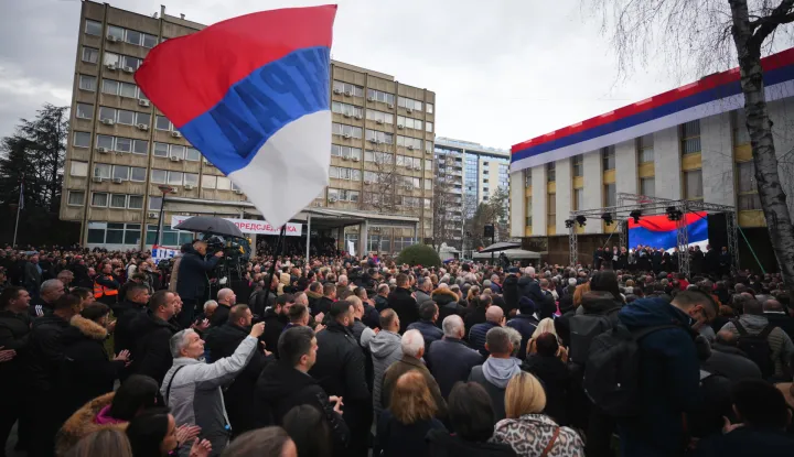 epa11925860 People endorsing the President of Republika Srpska Milorad Dodik wave Serbian flags during his rally of support in Banja Luka, Bosnia and Herzegovina, 26 February 2025. Dodik has been sentenced to one year in prison and barred from public office for six years in a first-instance verdict for disobeying the decisions of Bosnia and Herzegovina's international envoy, High Representative Christian Schmidt. EPA/NIDAL SALJIC