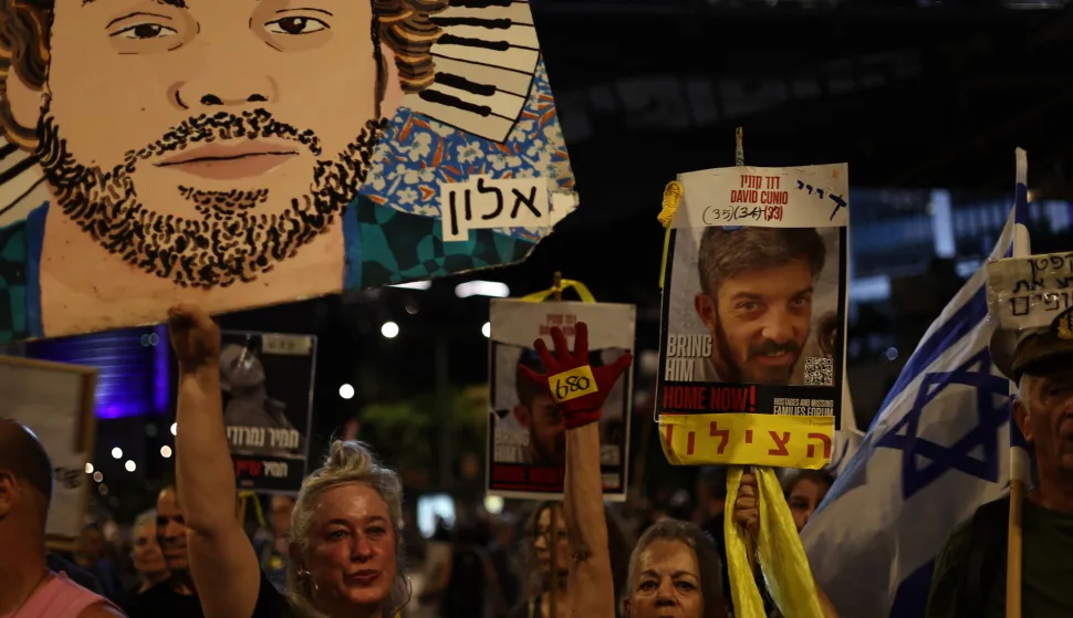 epa12305076 Protesters attend a demonstration outside the Kirya military headquarters in Tel Aviv, Israel, 16 August 2025. Families of Israeli hostages and their supporters took to the streets calling on the government to sign a hostages release and ceasefire deal. EPA/ATEF SAFADI