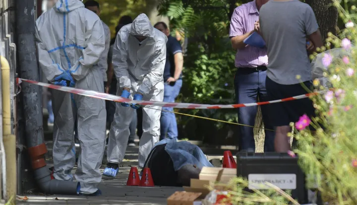 epa12336373 Ukrainian forensic experts work at the scene of a shooting in Lviv, western Ukraine, 30 August 2025, amid the Russian invasion. Ukrainian authorities said that Andriy Parubiy, a former speaker of the Ukrainian Parliament (Verkhovna Rada), was shot dead on 30 August 2025 in the western Ukrainian city of Lviv. Law enforcement agencies are currently investigating the murder and searching for the killer. EPA/MYKOLA TYS