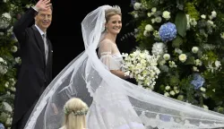 epa12335874 Hereditary Prince Alois of Liechtenstein (L) waves next to his daughter Princess Marie Caroline of Liechtenstein on the day of her wedding in Vaduz, Liechtenstein, 30 August 2025. The princess will marry her fiance Leopoldo Maduro Vollmer at the St. Florin Cathedral. EPA/WALTER BIERI