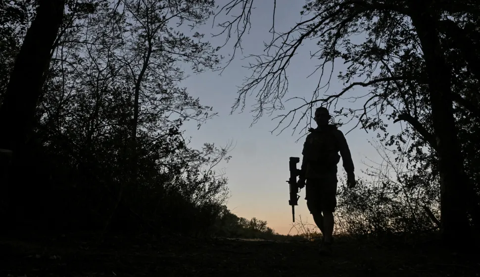 A serviceman of the 141st Separate Mechanized Brigade of the Ukrainian Armed Forces walks at a position near a front line, amid Russia's attack on Ukraine, in Donetsk region, Ukraine September 3, 2025. REUTERS/Stringer  TPX IMAGES OF THE DAY Photo: STRINGER/REUTERS