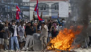 epa12362072 Protesters clash with police in front of the parliament building in Kathmandu, Nepal, 08 September 2025. Young demonstrators gathered in the capital to demand an end to corruption and the lifting of social media bans. The government shut down 26 platforms, including Facebook, YouTube, Instagram, and WhatsApp, after they refused to register in Nepal. At least six people were killed and dozens were injured during the protest. EPA/NARENDRA SHRESTHA