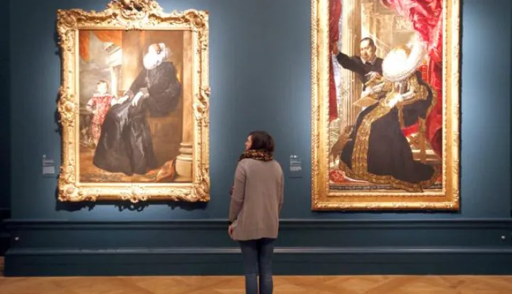 Rubens exhibition - LondonA visitor gazes at Van Dyck's work 'A Genoses Noblewoman and her Son' (left) hung along side Rubens' work 'Portrait of Maria Grimaldi and Dwarf' during a press preview of the 'Rubens and his Legacy:Van Dyck to Cezanne' exhibition at the Royal Academy of Arts, London.Jonathan Brady Photo: Press Association/PIXSELL------ZADNJA2 ST