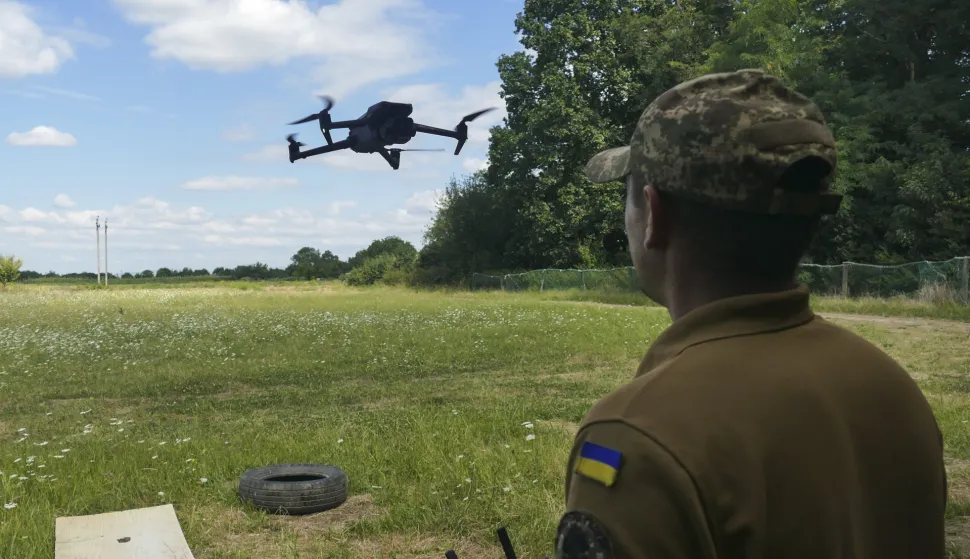 epa12310031 A Ukrainian recruit operates a drone at a training center for First-Person View (FPV) drone operators, at an undisclosed location in the Uzhhorod region, Western Ukraine, 18 August 2025. After about two months of training, the new pilots join the main military unit on the frontline on the Donetsk direction. EPA/IGOR TKACHENKO