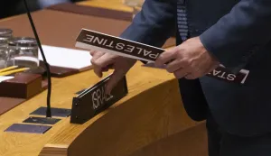 epa12285111 A United Nations staff member places name plates for Israel and Palestine at the start of an United Nations Security Council meeting on the conflict between Israel and Hamas at United Nations headquarters in New York, New York, USA, 05 August 2025. EPA/JUSTIN LANE