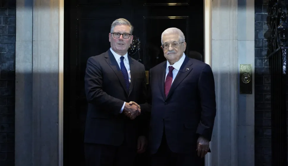 epa12362908 British Prime Minister Keir Starmer (L) greets the President of the Palestinian Authority, Mahmoud Abbas (R) outside 10 Downing Street in London, Britain, 08 September 2025. EPA/TOLGA AKMEN