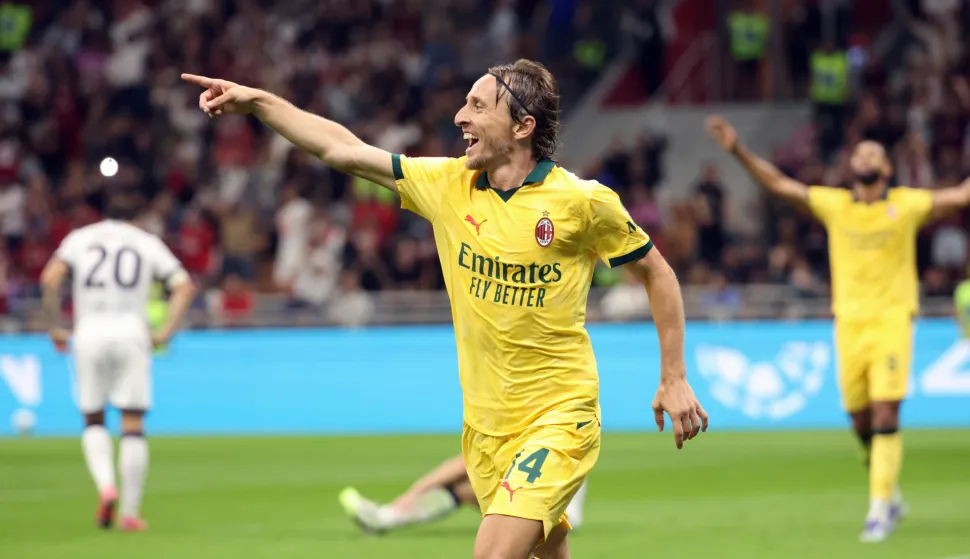 epa12377474 AC Milan's Luka Modric celebrates scoring the 1-0 goal during the Italian Serie A soccer match between AC Milan and Bologna FC 1909, in Milan, Italy, 14 September 2025. EPA/MATTEO BAZZI