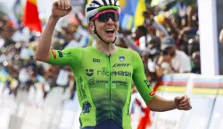 epa12412819 Tadej Pogacar from Slovenia reacts after winning the Elite Men race at the UCI Road Cycling World Championships in Kigali, Rwanda, 28 September 2025. EPA/KIM LUDBROOK