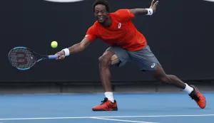epa07288403 Gael Monfils of France in action against Taylor Fritz of the USA during their second round men's singles match at the Australian Open Grand Slam tennis tournament in Melbourne, Australia, 16 January 2019. EPA/RITCHIE TONGO