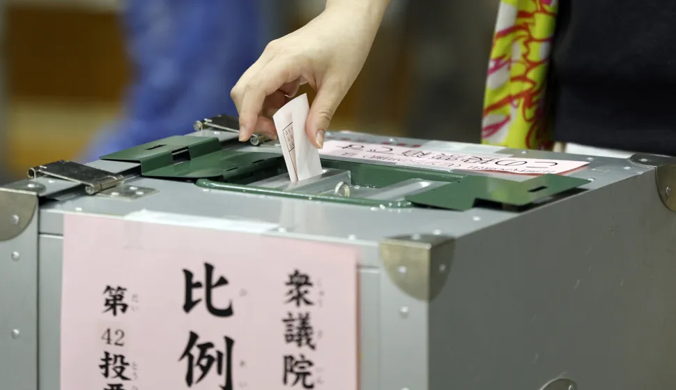 epa11686249 A woman casts her ballot during the general election at a polling station in Tokyo, Japan, 27 October 2024. Following the dissolution of the parliament by Japan's Prime Minister Shigeru Ishiba, voters are called for elections of the house of representatives (the lower house). EPA/FRANCK ROBICHON