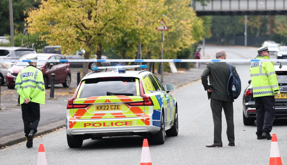 epa12423277 A police cordon in Manchester, Britain, 02 October 2025. Two people have died after a car and stabbing attack at a synagogue in Manchester. EPA/ADAM VAUGHAN