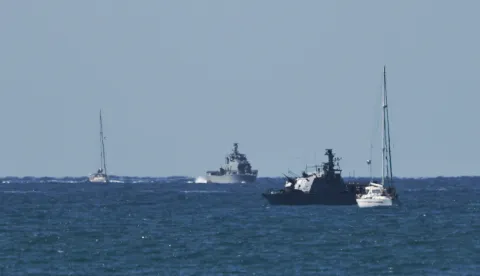epa12423140 Vessels of the Global Sumud Flotilla arriving at Ashdod port 02 October 2025 after being intercepted whilst carrying aid to Gaza. Israel's Foreign Ministry announced that several vessels that form part of the Global Sumud Flotilla (GSF) had been stopped and that those aboard were being transferred to an Israeli port. EPA/ATEF SAFADI