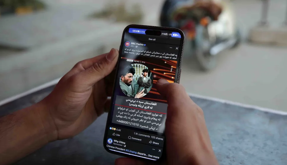 epa12420619 An Afghan man uses a mobile phone as internet and telecom services are gradually restoring after almost three days of closures in Kabul, Afghanistan, 01 October 2025. Afghanistan restored mobile networks and the internet on 01 October after a two-day nationwide shutdown ordered by Taliban authorities. The blackout halted businesses, banks, and travel, leaving the country nearly cut off. Netblocks called it a deliberate disconnection. Connectivity?s return sparked street celebrations in Kabul, with residents likening the moment to a holiday. EPA/SAMIULLAH POPAL