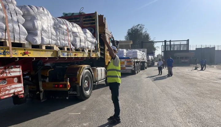 epa12265268 Trucks loaded with humanitarian aid cross the Rafah border gate, between Egypt and the Gaza Strip, in Rafah, Egypt, 27 July 2025. The Israeli army declared a 'tactical pause' in military operations in parts of the Gaza Strip on 27 July, to facilitate the safe passage of humanitarian aid convoys. EPA/STRINGER