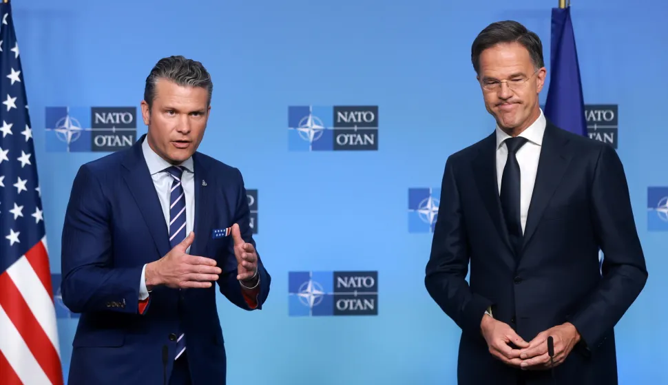 epa12454733 NATO Secretary General Mark Rutte (R) welcomes US Secretary of War Pete Hegseth before NATO Ministers of Defence meeting in Brussels, Belgium, 15 October 2025. The meeting of the North Atlantic Council in Defence Ministers' Session will be followed by a Ukraine Contact Group meeting. EPA/OLIVIER HOSLET