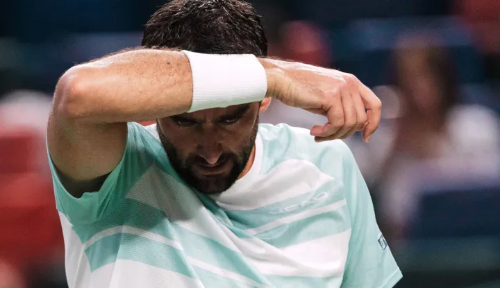 epa12427752 Marin Cilic of Croatia reacts during his Men's Singles match against Novak Djokovic of Serbia at the Shanghai Masters tennis tournament in Shanghai, China, 03 October 2025. EPA/ALEX PLAVEVSKI